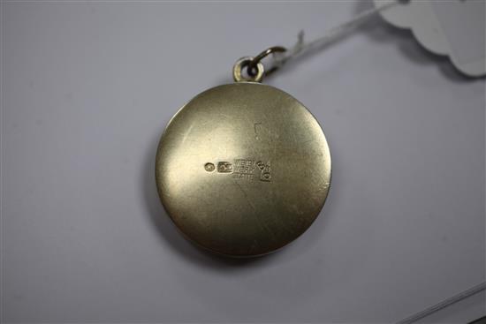 An early 20th century Austrian Art Nouveau Wiener Werkstatte silver gilt circular pendant locket by Berthold Loffler, 1.25in.